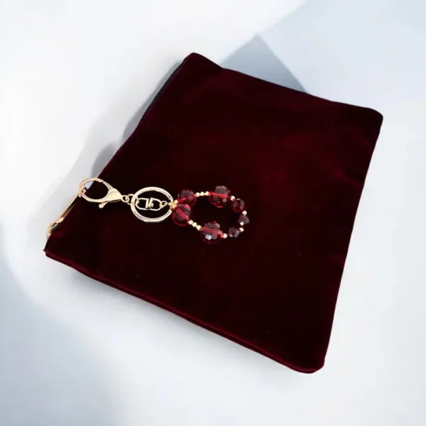 Pochette Velvet charm bordeaux